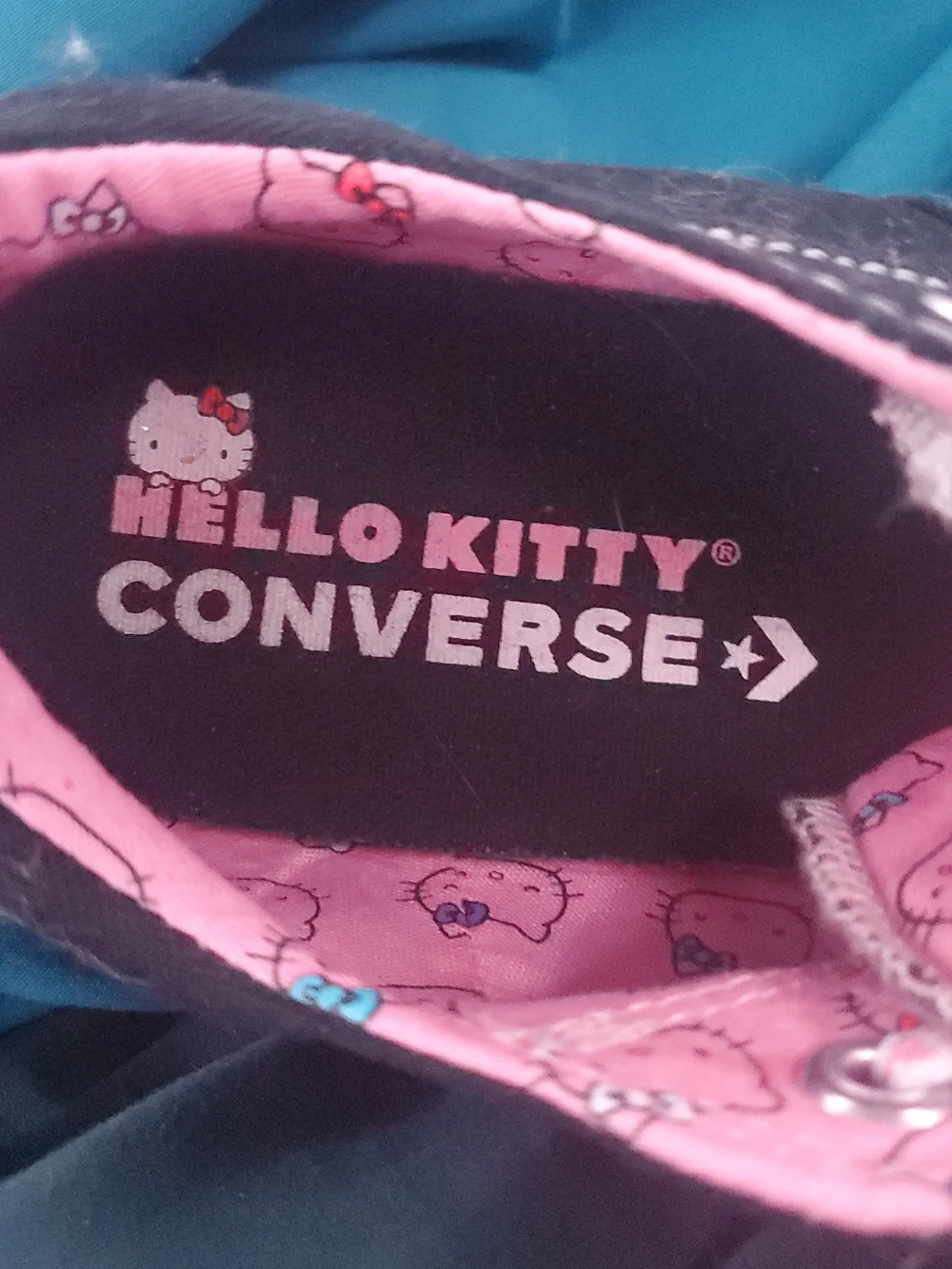 Converse Black Canvas Low-Top Sneakers with Pink Hello Kitty Accents
